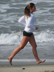 Woman Running Barefoot